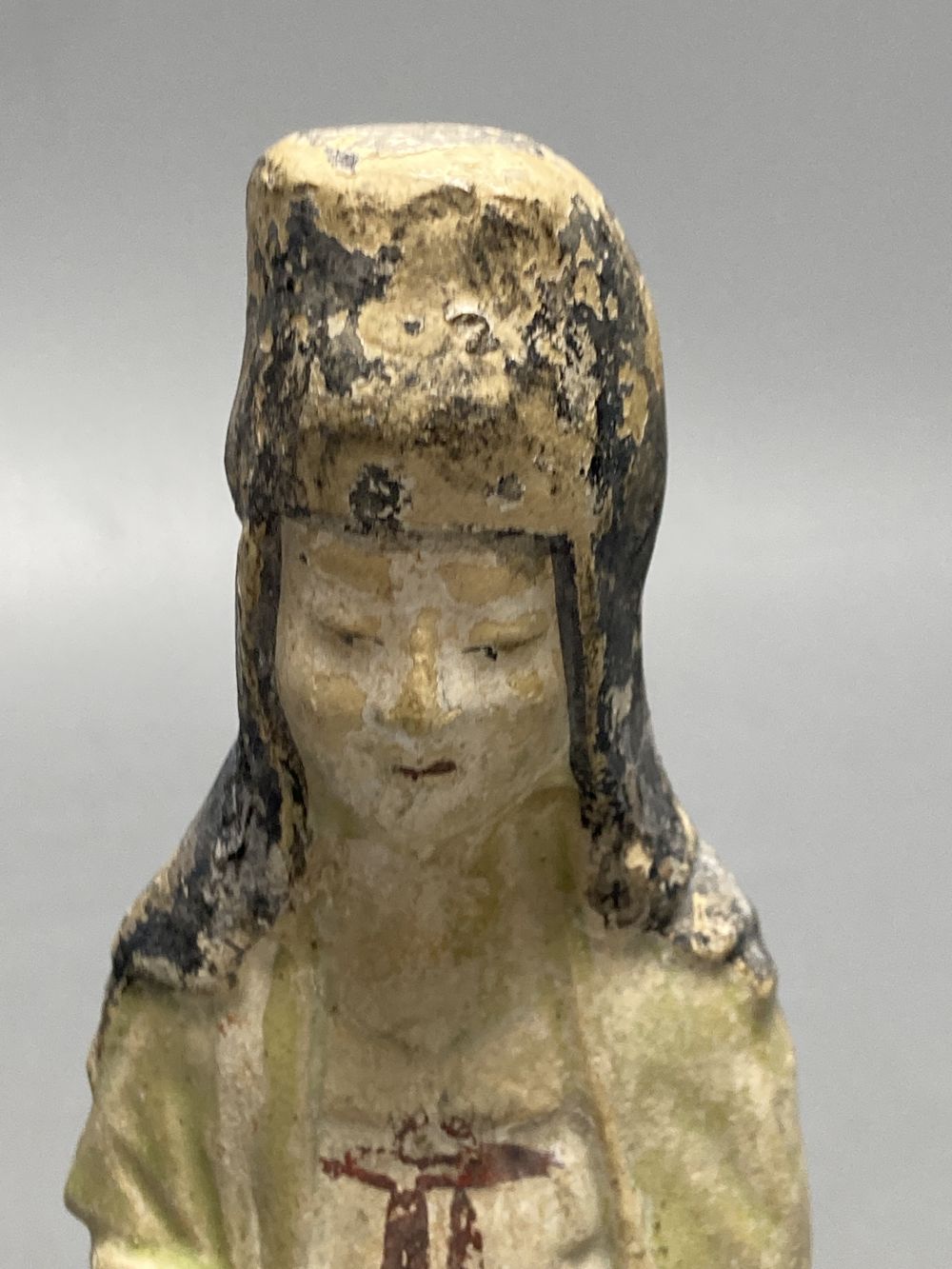 A Chinese part glazed pottery lady, Tang, height 20cm